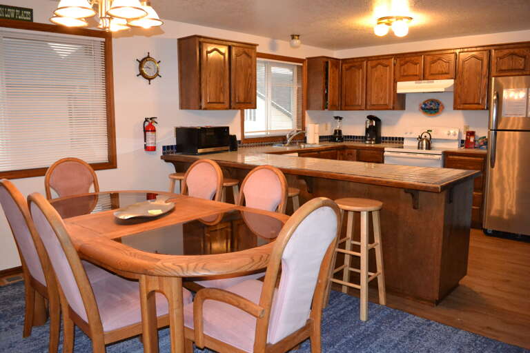 Dining Room Table seats 6  4 Stools at the bar