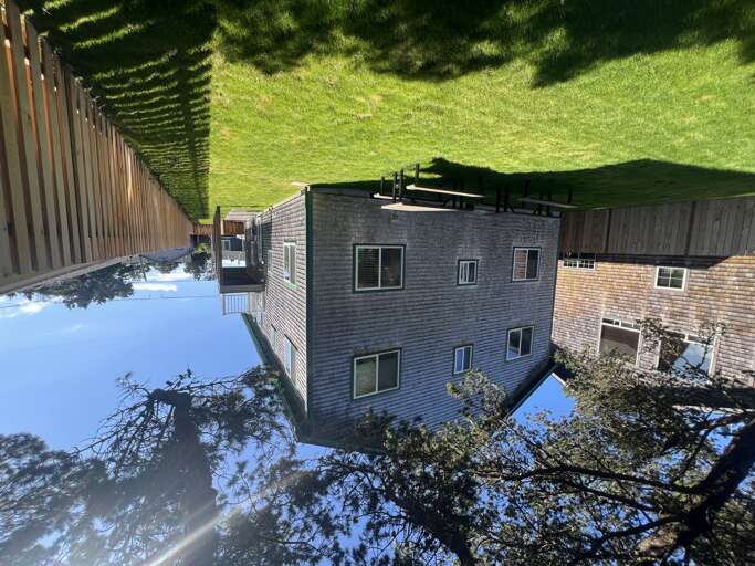 The property is situated in a peaceful residential area with well-maintained homes and mature trees providing natural shade and privacy throughout the neighborhood.