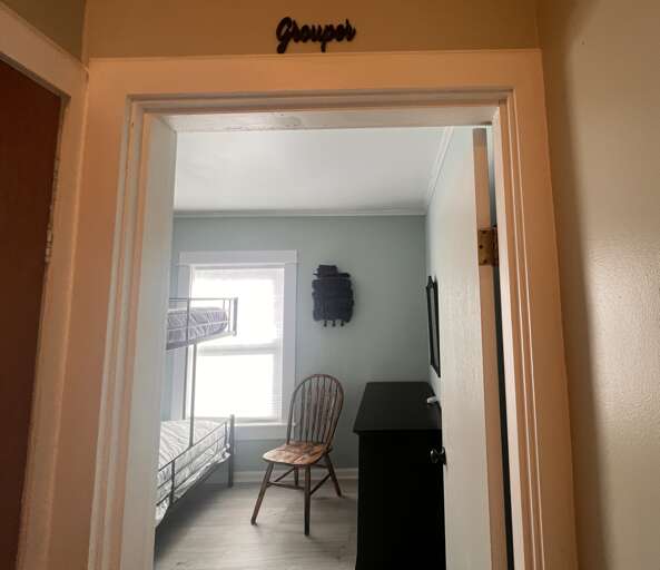 Step into your private retreat with a cozy bunk bed setup, perfect for families or groups. Natural light fills the space, creating a welcoming atmosphere for restful nights.