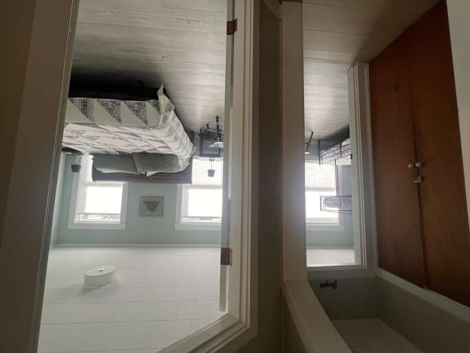 Enjoy cozy comfort in your private bedroom with soft linens, ample natural light, and a spacious wardrobe to store your belongings during your stay.