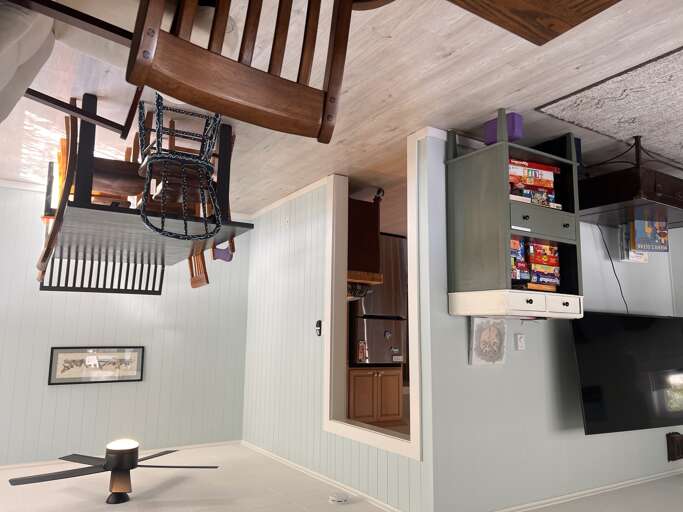 Your cozy retreat features a lofted bedroom, full kitchen with modern appliances, and warm wood accentsâa perfect blend of rustic charm and contemporary comfort for your stay.