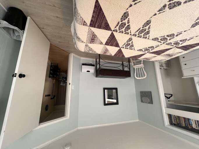 Relax in your cozy bedroom with stylish linens, organized storage, and thoughtful touches that make this space feel like home during your stay.