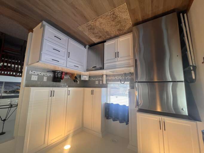 Your fully equipped kitchen features stainless steel appliances, granite countertops, and ample cabinet storage for all your culinary adventures.