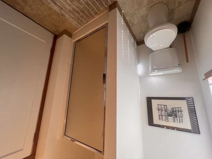Your private bathroom features modern fixtures and thoughtful touches, including artwork that adds character to your personal space.