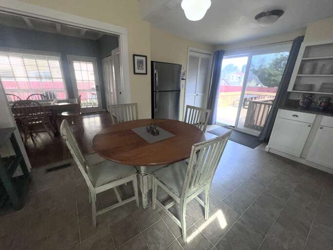 Your bright, fully-equipped kitchen awaits with a charming dining table for memorable meals together.