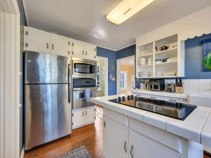 Your fully equipped kitchen features modern appliances, generous counter space, and everything you need to prepare home-cooked meals during your stay.