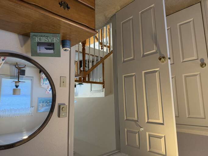 Welcome to your cozy coastal retreat! You'll love the charming nautical touches and natural light that fills this inviting space, setting the perfect tone for your beachside getaway.