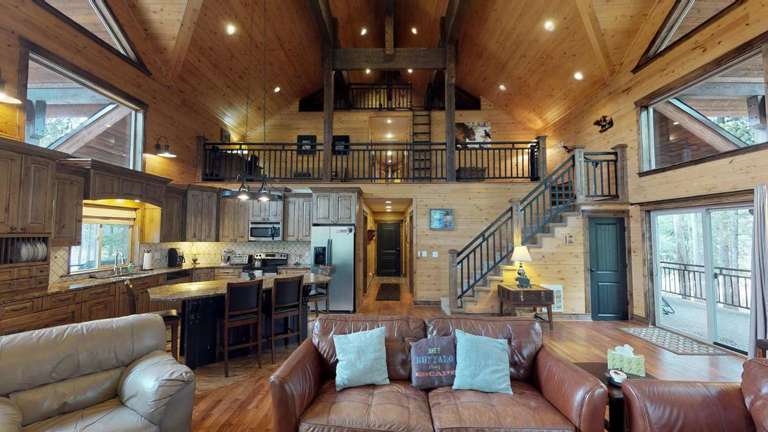 Wooden Interior Living Space With Kitchen And Loft
