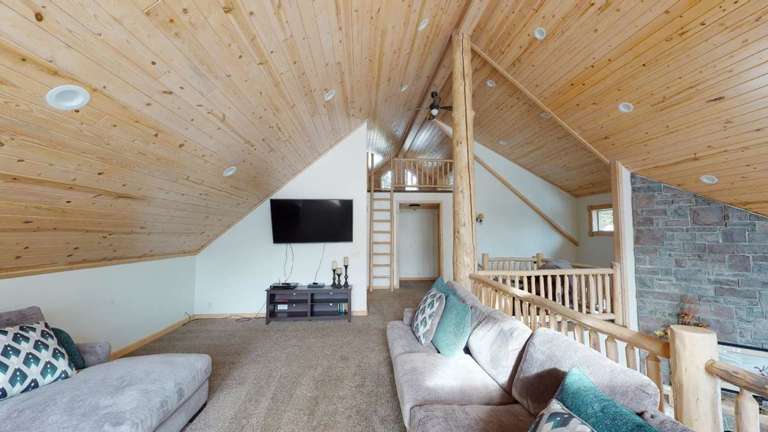 Wooden Interior Living Space With Loft