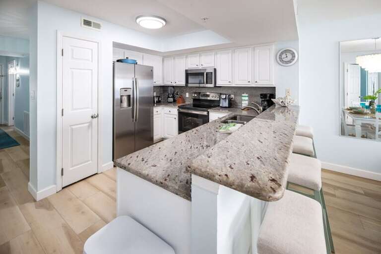 Kitchen with Granite and Stainless Upgrades - 
Gulf Dunes 408 Fort Walton Beach Okaloosa Island Vacation Rentals Kitchen with Granite and Stainless Upgrades - 
Gulf Dunes 408 Fort Walton Beach Okaloosa Island Vacation Rentals