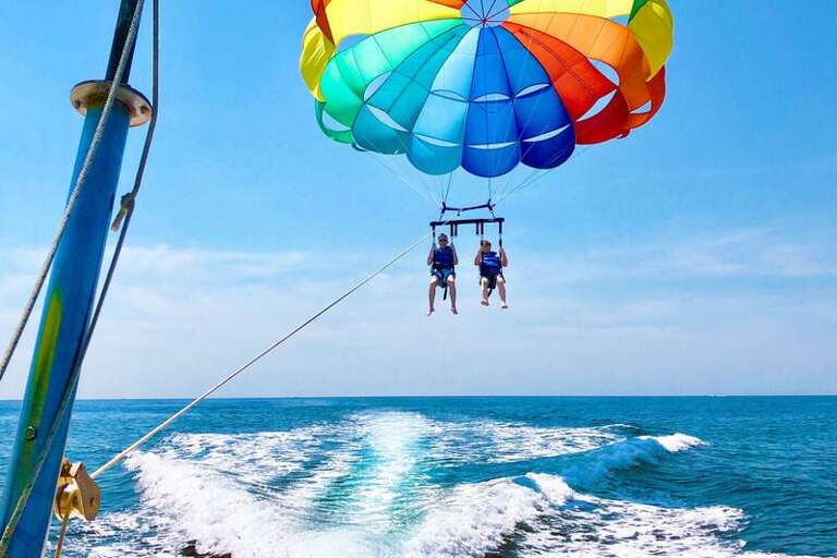 NEARBY ATTRACTIONS:  Parasailing Recommended by Sunset Resort Rentals Vacation Rentals