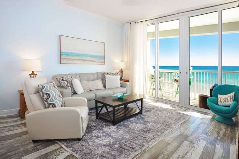 Living Room with Balcony - Waters Edge Resort unit 613 Okaloosa Island Fort Walton Beach Vacation Rentals by Sunset Resort Rentals