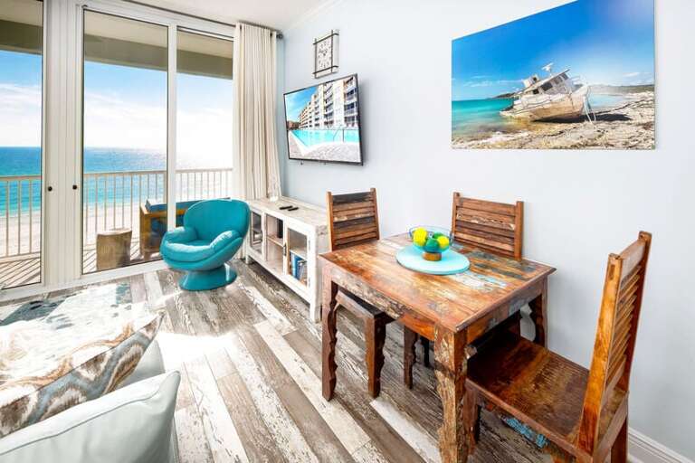 Living Room with Balcony - Waters Edge Resort unit 613 Okaloosa Island Fort Walton Beach Vacation Rentals by Sunset Resort Rentals
