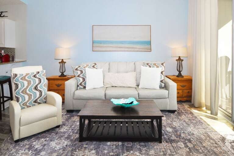 Living Room with Balcony - Waters Edge Resort unit 613 Okaloosa Island Fort Walton Beach Vacation Rentals by Sunset Resort Rentals