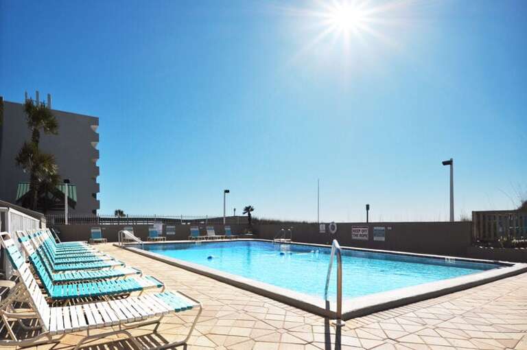 Resort Beachfront Pool and Lounge Area - Emerald Isle Resort 712, Okaloosa Island, Fort Walton Beach Vacation Rentals by Sunset Resort Rentals