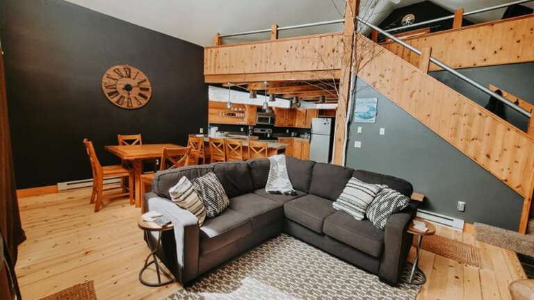 Interior Living Space With Sectional Sofa And Loft Area Interior Living Space With Sectional Sofa And Loft Area