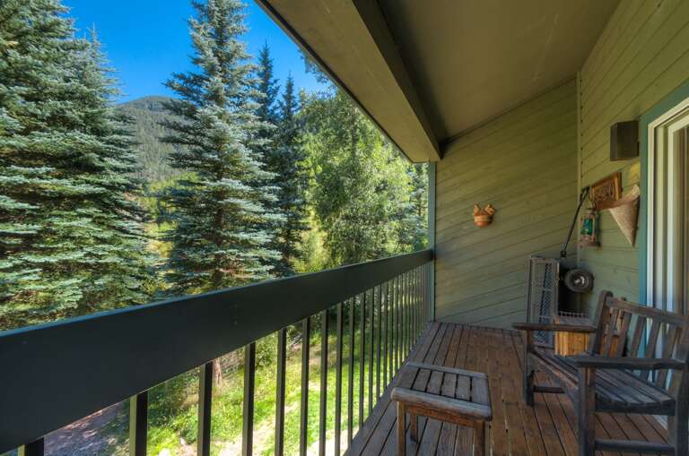 Wood deck with outdoor furniture with tree view Wood deck with outdoor furniture with tree view