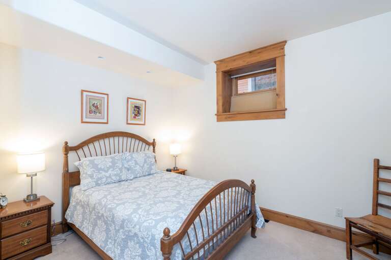 Guest bedroom with queen bed.