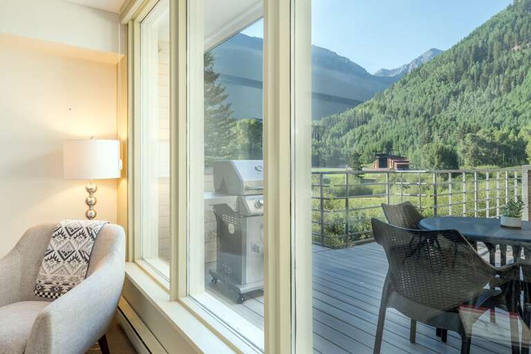 View of deck with seating and grill. View of deck with seating and grill.