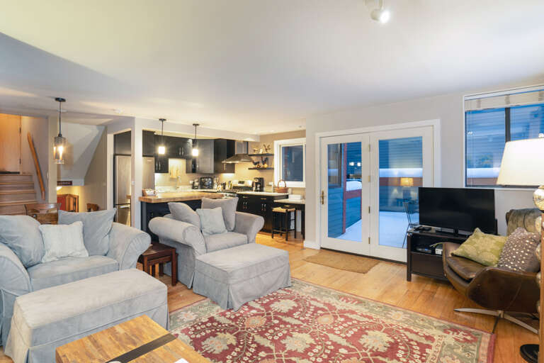 Living room with balcony access. Living room with balcony access.