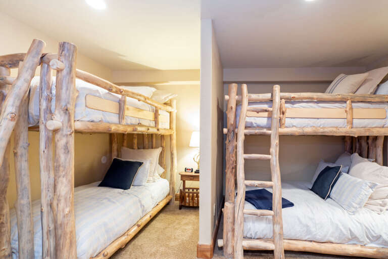 Two sets of bunk beds in a side bedroom. Two sets of bunk beds in a side bedroom.