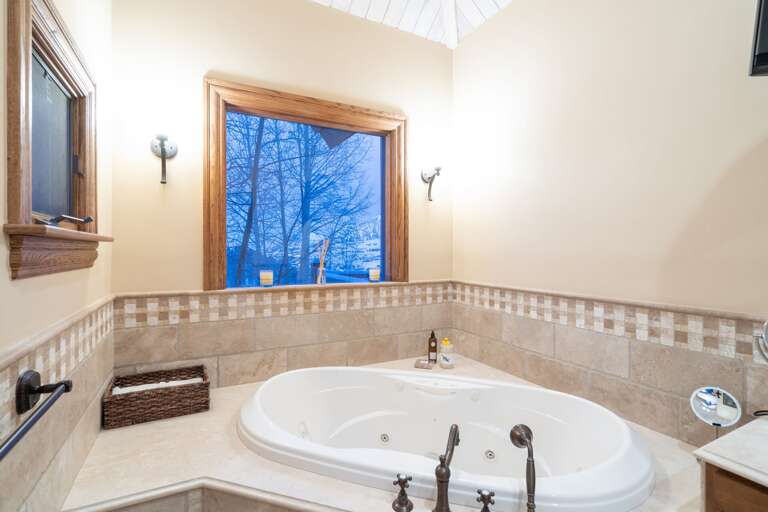 Spa tub with window above it. Spa tub with window above it.