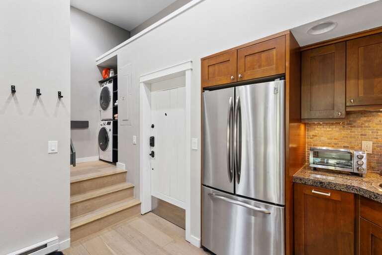 The entryway of Columbia 8. Ski storage is a locker in the interior hallway of the building. The entryway of Columbia 8. Ski storage is a locker in the interior hallway of the building.