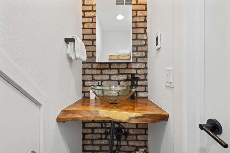 Stylish half bathroom on the first floor. Stylish half bathroom on the first floor.