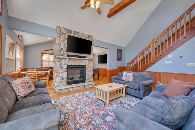 Cozy Conversation in the 2dn Floor Great Room with See Through Fireplace.