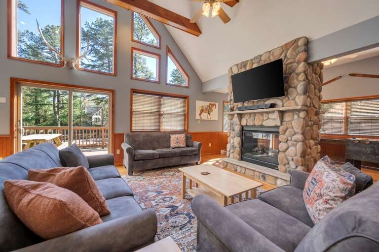 Take in the Wonderful View while Getting Comfy in the 2dn Floor Great Room with See Through Fireplace.