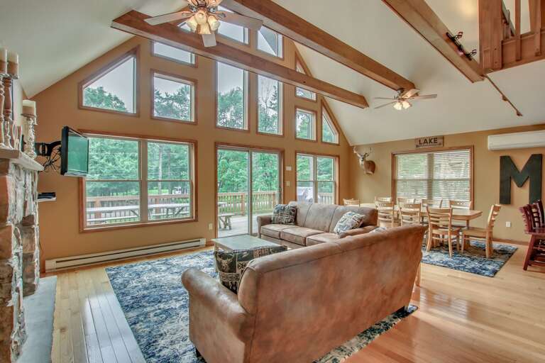 two couches next to patio windows