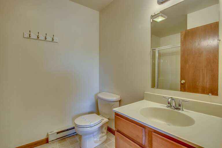 single bathroom with toilet and sink