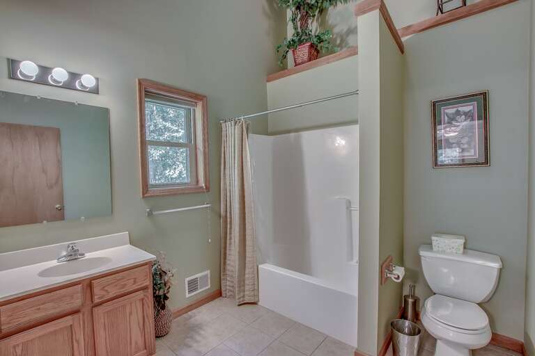 This Lake Harmony rentals master bathroom, with shower, toilet, and double sink. This Lake Harmony rentals master bathroom, with shower, toilet, and double sink.