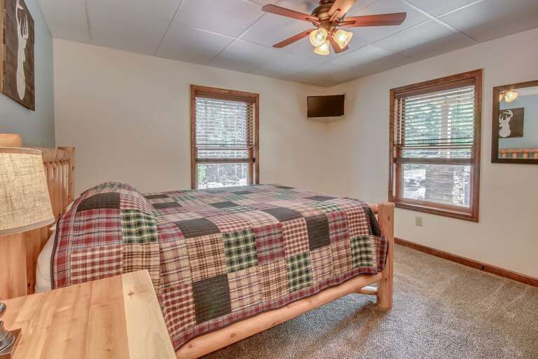 Alternate View of Bedroom with Bed, Cieling Fan, and Windows