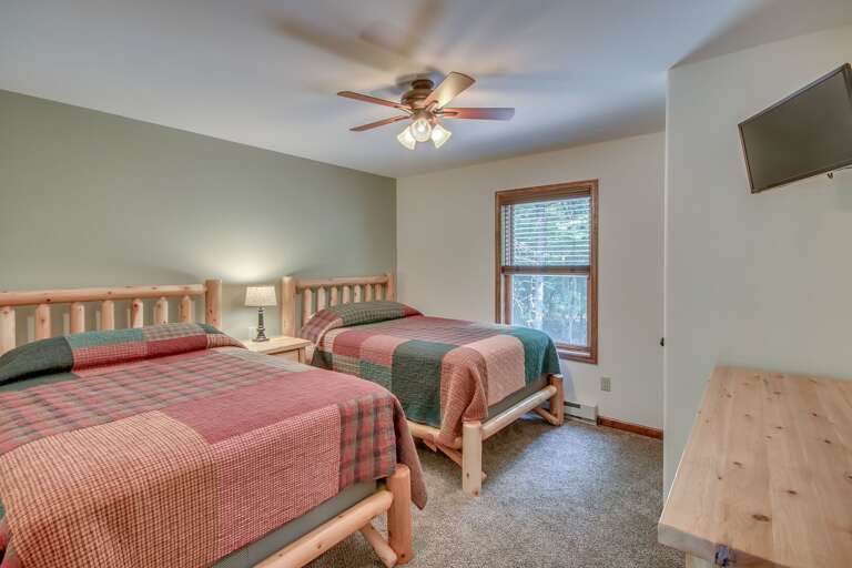 Bedroom with Two Beds and Views of the Surrounding Landscape