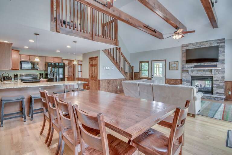 Great Room with TV, Fireplace, and Seating in our Poconos Vacation Rental Home