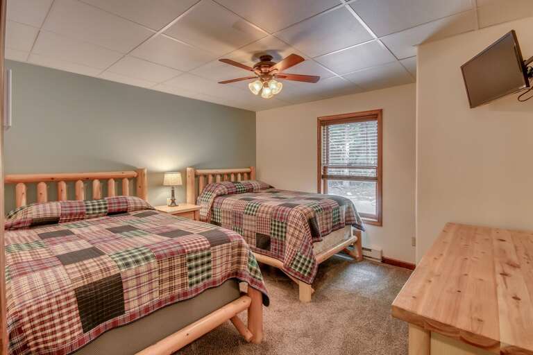 Room with Flat Screen TV, and Two Beds - Rustic Decor