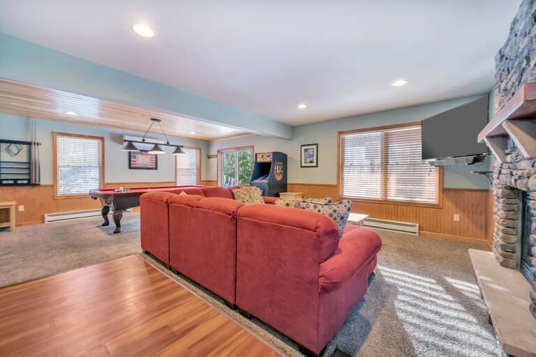 1st Floor Game Room with TV Viewing Area, Pool Table and Old School Arcade Game. 1st Floor Game Room with TV Viewing Area, Pool Table and Old School Arcade Game.