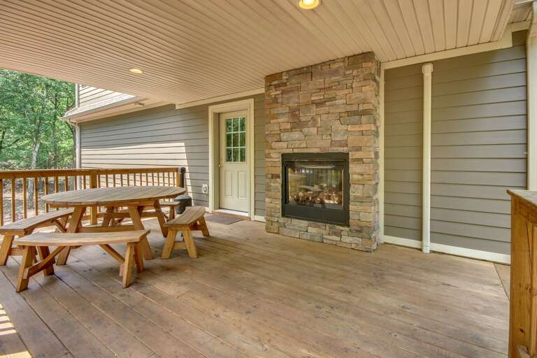 Covered Deck with Seating and Outdoor Fireplace Covered Deck with Seating and Outdoor Fireplace