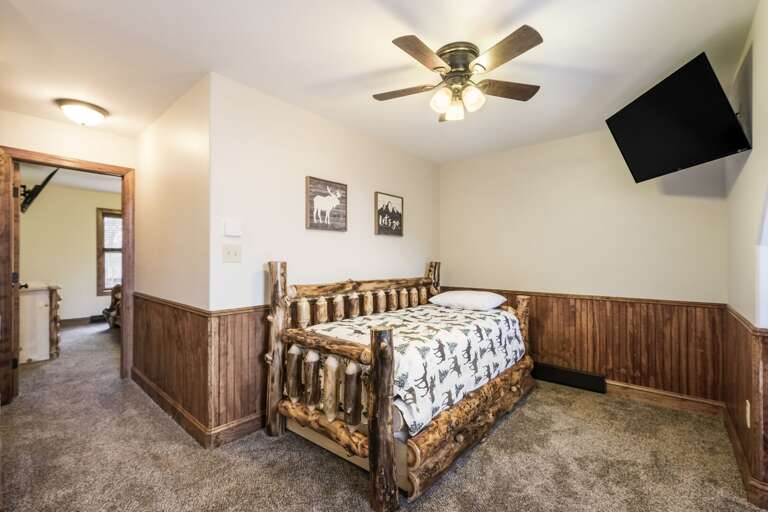 Alternate View of Loft with Bed and TV