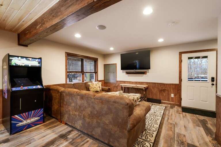 Arcade Game and Seating Area in Game Room