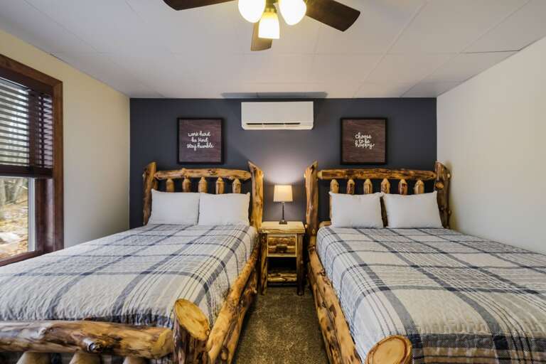 Close-Up of Matching Beds with Comfortable Linens