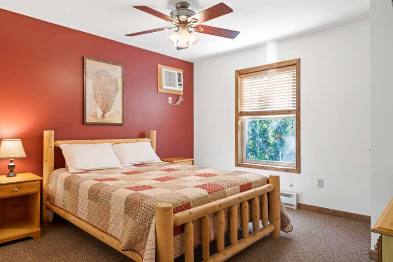 red bedroom with single bed