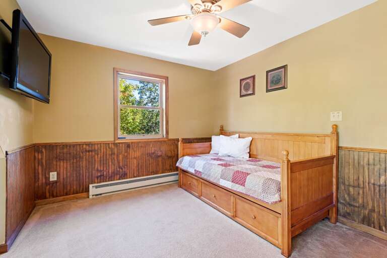 sleeper sofa in tan bedroom