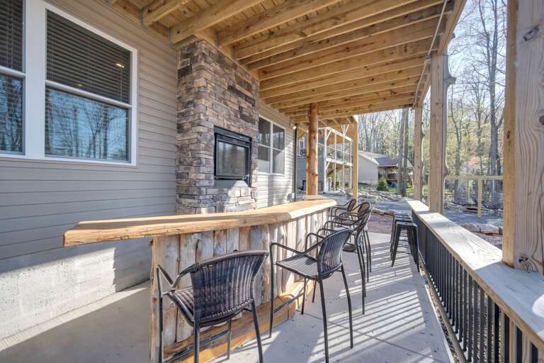 2nd Floor Outdoor Bar on Patio with Tons of Seating and Indoor/Outdoor Fireplace