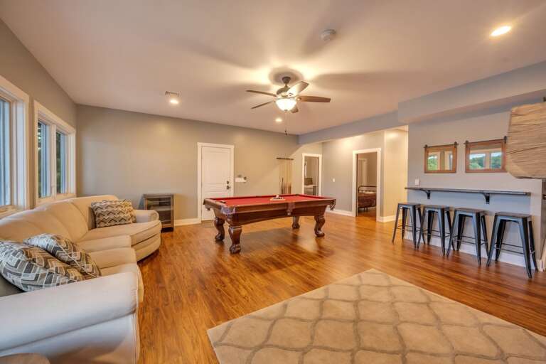 Plenty of Space to Chill at the Bar Top Seating & Sofas in the Game Room Plenty of Space to Chill at the Bar Top Seating & Sofas in the Game Room