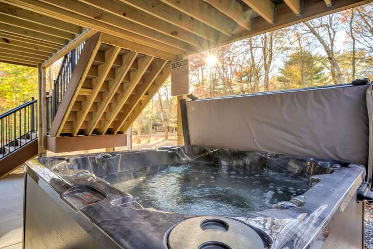 This 6-8 Person Outdoor Hot Tub is Tucked Away on the Ground Floor Patio. This 6-8 Person Outdoor Hot Tub is Tucked Away on the Ground Floor Patio.