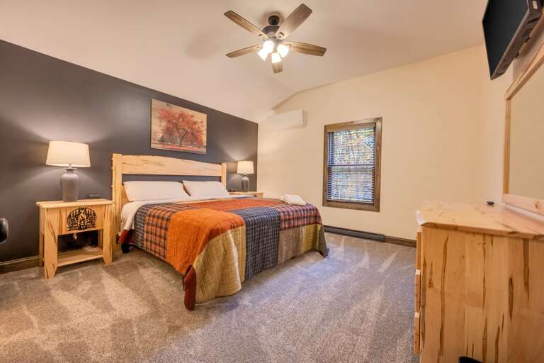 The Comfy Quilt and Woodsy Views Abound in the 3rd Floor Bedroom 8 with TV and King Bed (sleeps 2). The Comfy Quilt and Woodsy Views Abound in the 3rd Floor Bedroom 8 with TV and King Bed (sleeps 2).