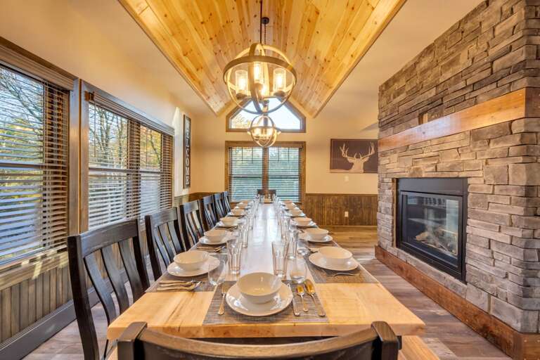 Plenty of Room at the Grand Dining Table with High back Chairs and Bench Seating for up to 12. Plenty of Room at the Grand Dining Table with High back Chairs and Bench Seating for up to 12.