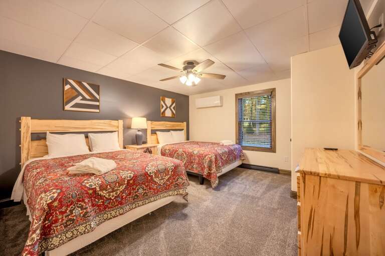 Rustic Relaxation in the 1st Floor Bedroom 1 with 2 Queen Beds (sleeps 4). Rustic Relaxation in the 1st Floor Bedroom 1 with 2 Queen Beds (sleeps 4).